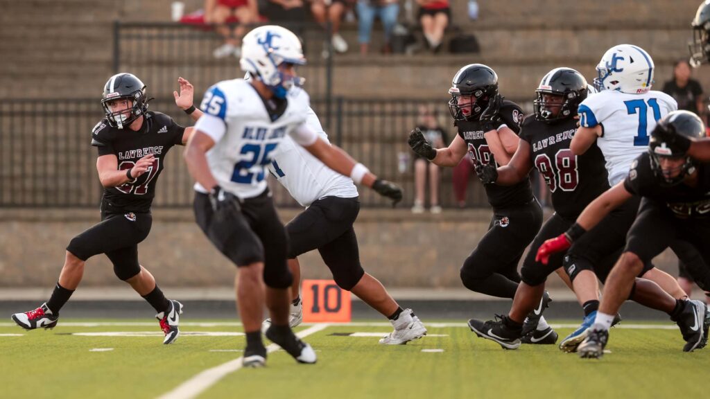Lawrence football vs. Junction City, Week 2-12