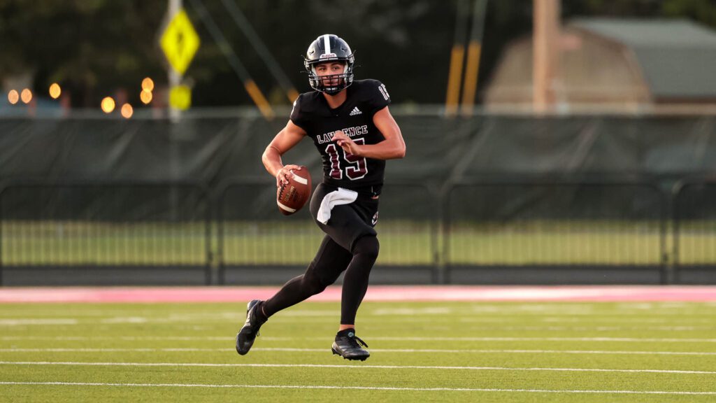Lawrence football vs. Junction City, Week 2-16