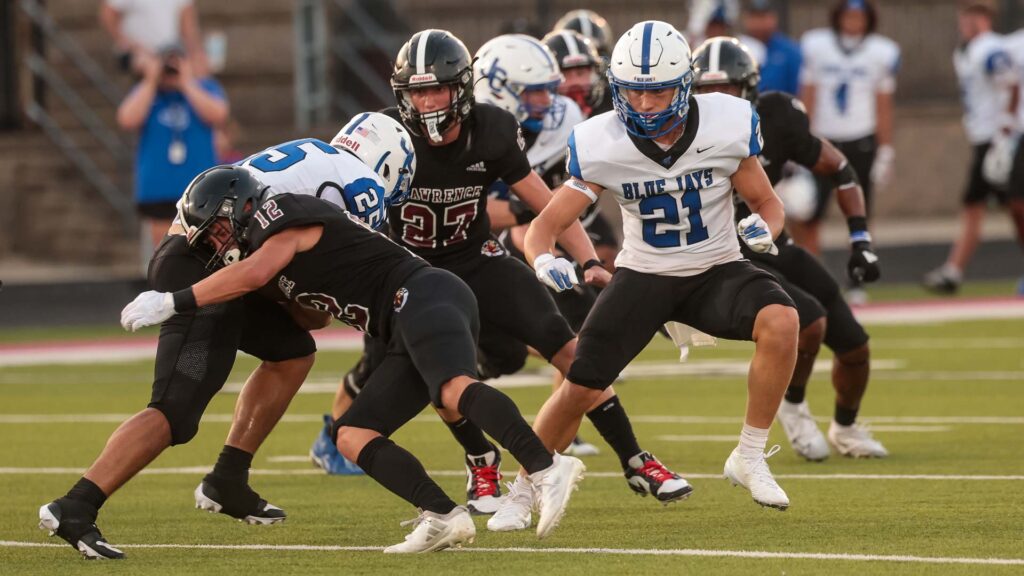Lawrence football vs. Junction City, Week 2-17