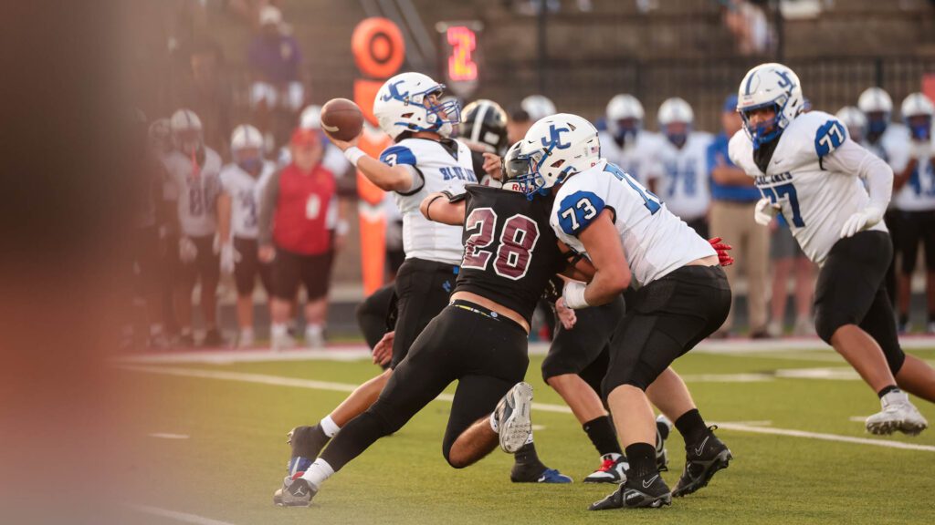 Lawrence football vs. Junction City, Week 2-18