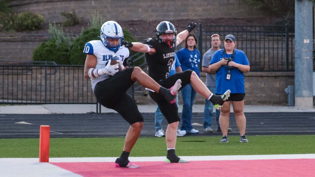 Lawrence football vs. Junction City, Week 2-23