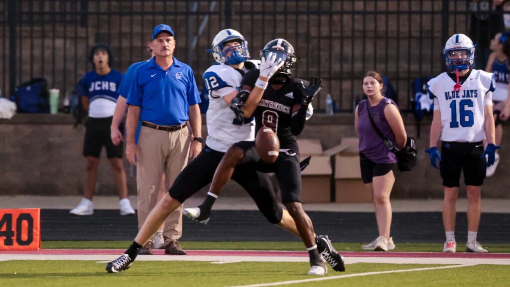Lawrence football vs. Junction City, Week 2-24