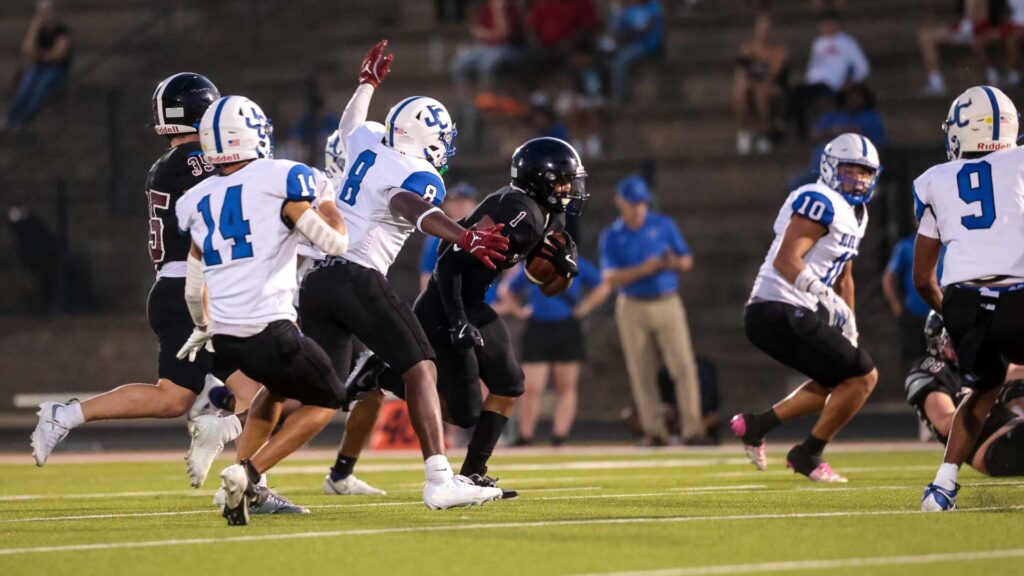 Lawrence football vs. Junction City, Week 2-25