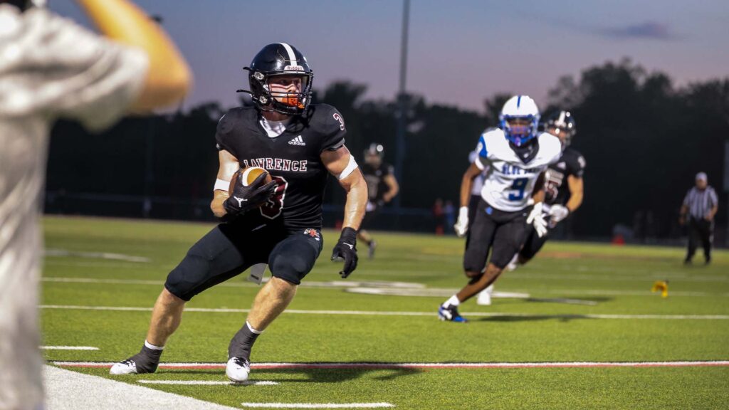 Lawrence football vs. Junction City, Week 2-27