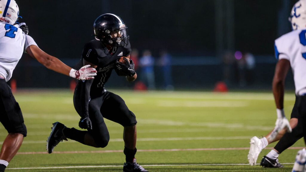 Lawrence football vs. Junction City, Week 2-28