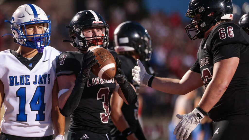 Lawrence football vs. Junction City, Week 2-29